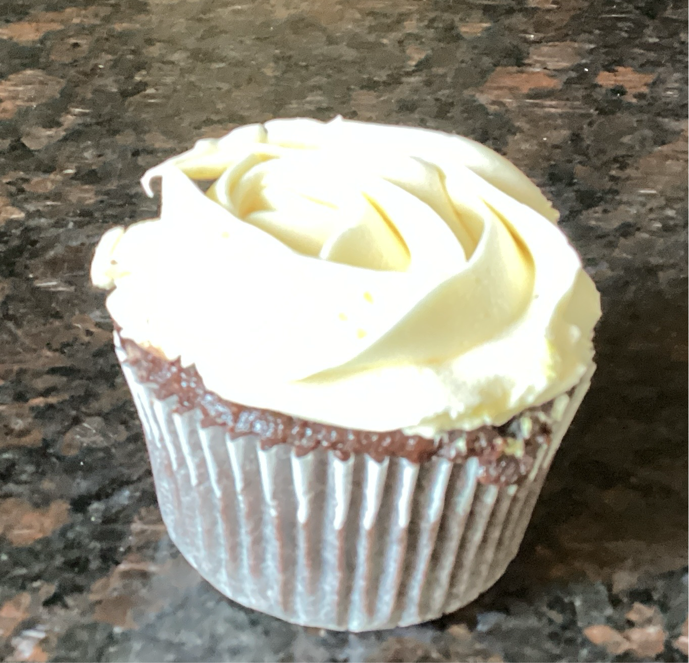 Chocolate cupcake with vanilla buttercream frosting