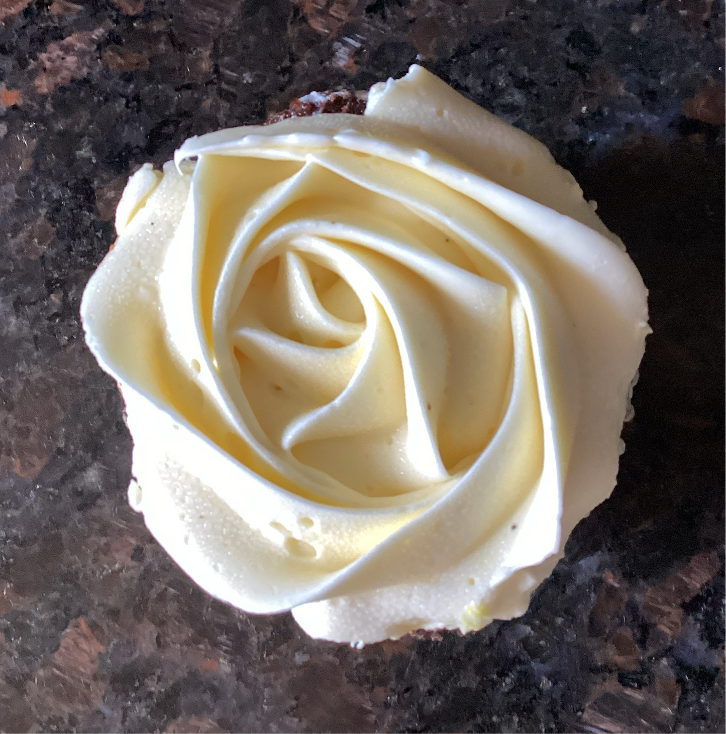 Chocolate cupcake with vanilla buttercream frosting