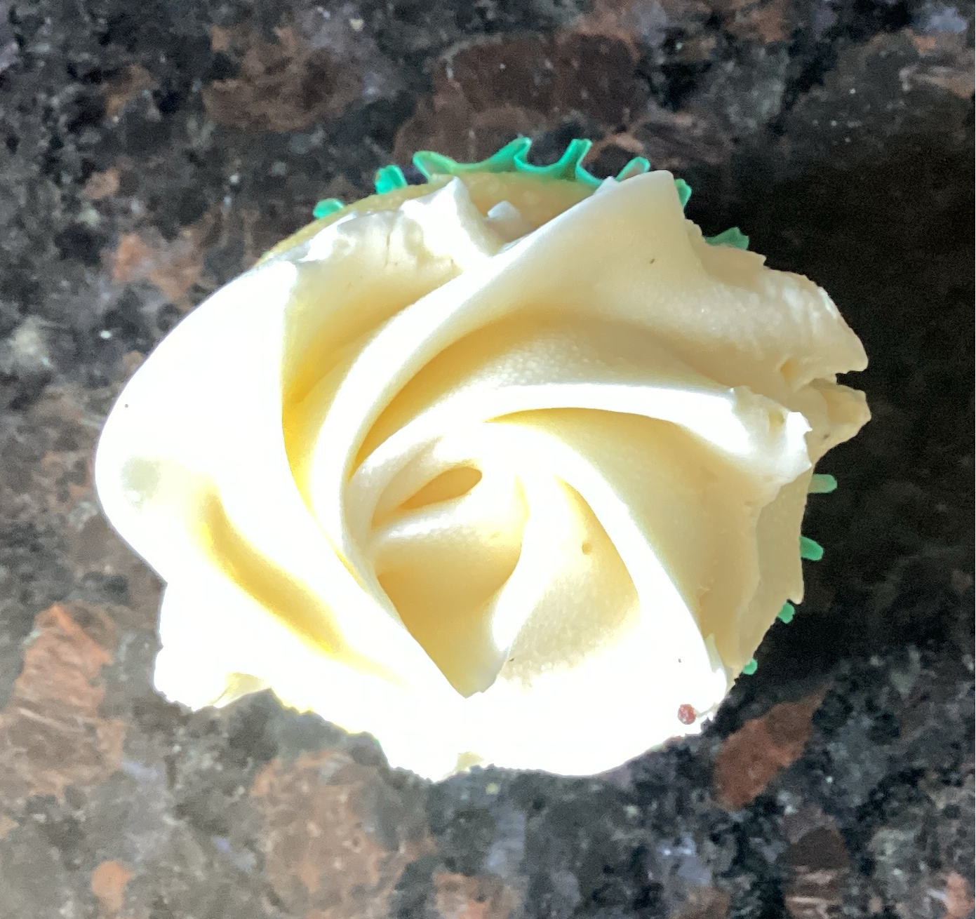Mini vanilla cupcake with vanilla buttercream frosting