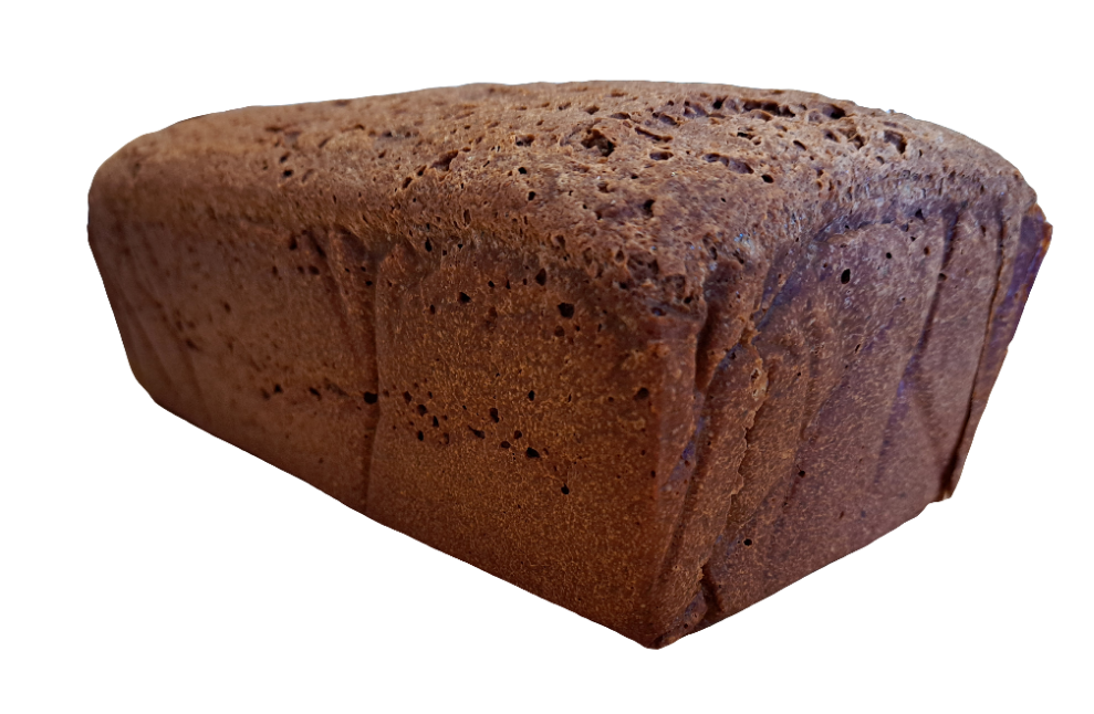 Full sized loaf of dark pumpernickel rice bread