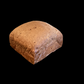 Half loaf of dark pumpernickel rice bread