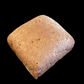 Half loaf of dark pumpernickel rice bread 