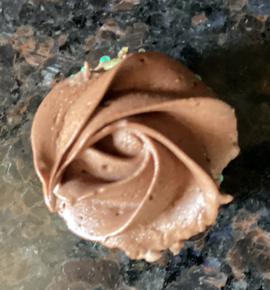 Mini vanilla cupcake with chocolate buttercream frosting 